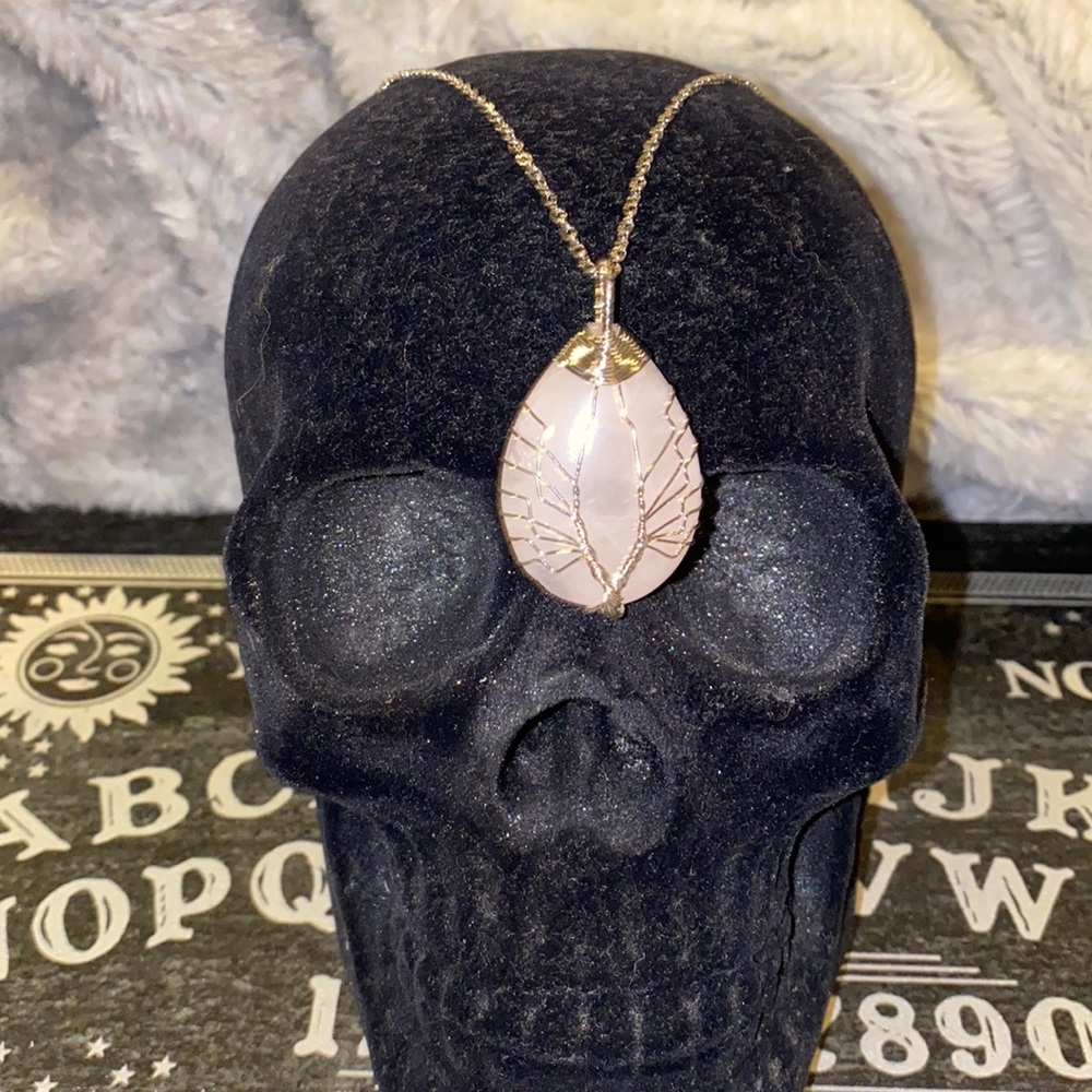 Rose quartz wrapped pendant